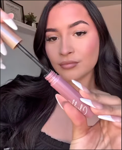 Applying Chella Eyebrow Cream with the built-in angled brush